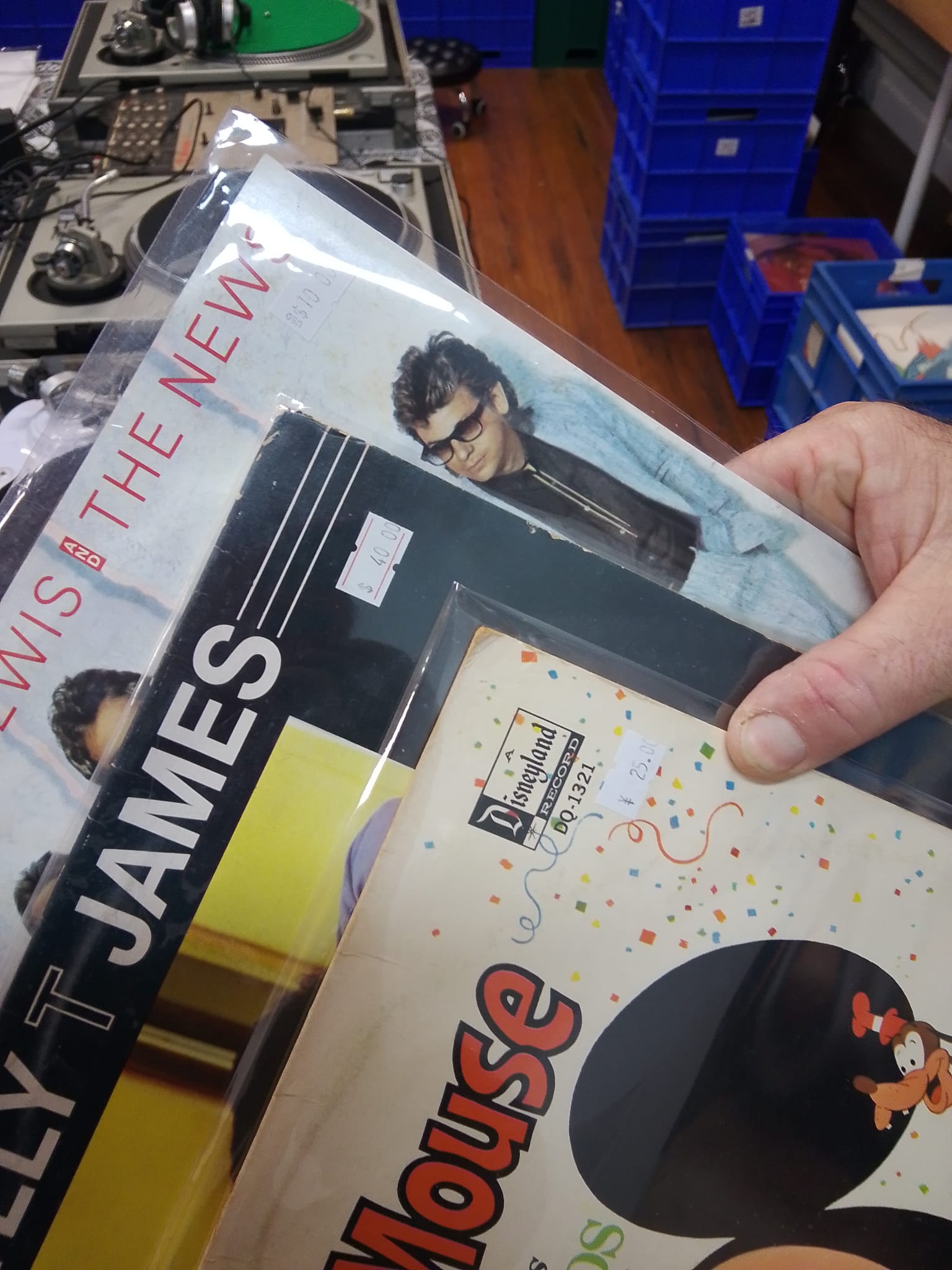 Vinyl records held inside RockMasta Records